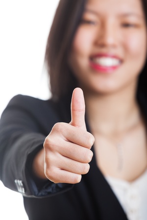 Young Chinese Woman with Thumb Upの写真素材