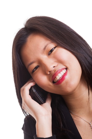 Young Chinese Woman Talking on Mobileの写真素材