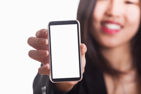 Young Chinese Woman Showing a Smartphoneの写真素材