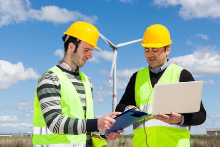 Two Engineers in a Wind Turbine Power Stationの写真素材