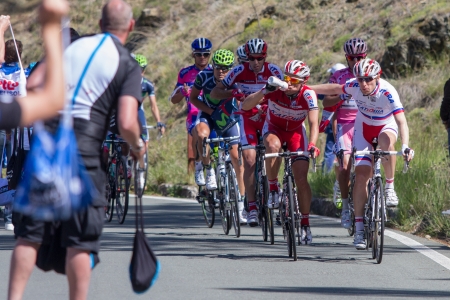 LA BARACCA, LA SPEZIA, ITALY - MAY 17: Cyclists taking supplies from their masseurs during the 12th stage of 2012 Giro d'Italia on May 17, 2012 in La Baracca, La Spezia, Italyのeditorial素材