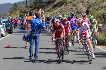 LA BARACCA, LA SPEZIA, ITALY - MAY 17: Cyclists taking supplies from their masseurs during the 12th stage of 2012 Giro d'Italia on May 17, 2012 in La Baracca, La Spezia, Italyのeditorial素材