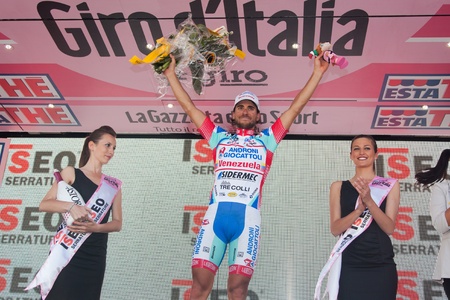MONTECATINI TERME, ITALY - MAY 16: Roberto Ferrari, Team Androni Giocattoli, celebrating the victory of the 11th stage of 2012 Giro d'Italia on May 16, 2012 in Montecatini Terme, Italyのeditorial素材