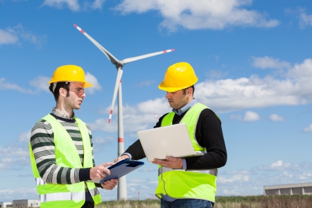Two Engineers in a Wind Turbine Power Stationの写真素材