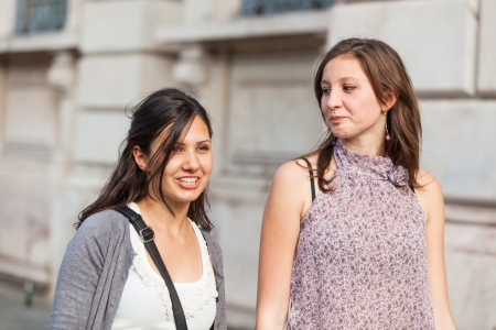 Two Young Women Walking in the Cityの写真素材