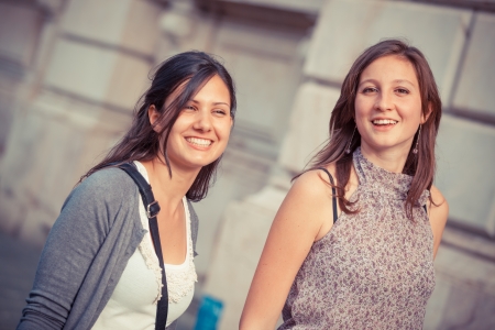 Two Young Women Walking in the Cityの写真素材