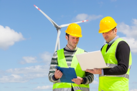 Two Engineers in a Wind Turbine Power Stationの写真素材