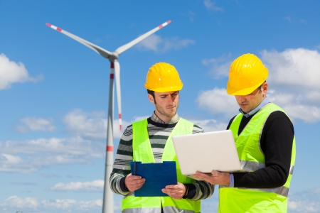 Two Engineers in a Wind Turbine Power Stationの写真素材