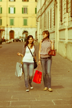 Couple of Women with Shopping Bagsの写真素材