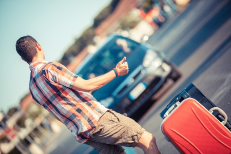 Young Man Hitchhikingの写真素材