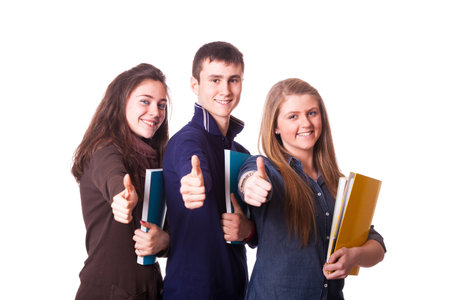 Teenage Students with Thumbs Upの写真素材