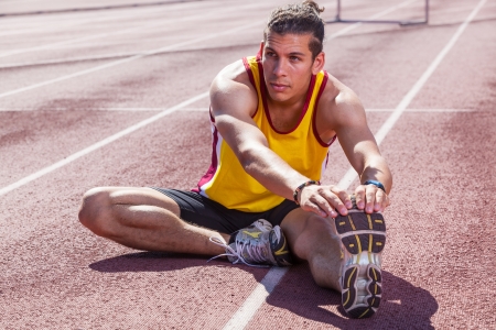 Track and Field Athlete Stretchingの写真素材