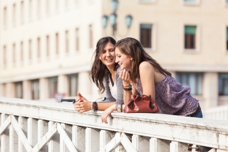 Two Women Talking in the Cityの写真素材