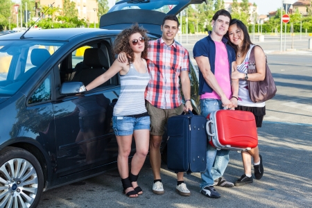 Four Friends Ready to Leave For Vacationの写真素材