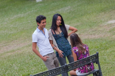 Group of Teenagers Talking at Parkの写真素材