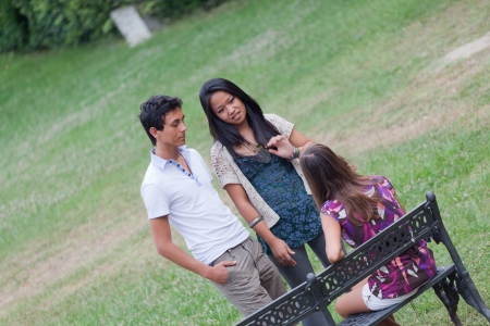 Group of Teenagers Talking at Parkの写真素材