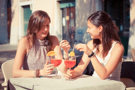Two Young Women with a Cold Drinkの写真素材