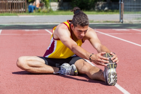 Track and Field Athlete Stretchingの写真素材