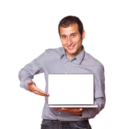 Young Man Holding a Computer with Blank Screenの写真素材