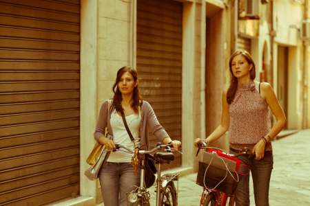 Couple of Women with Shopping Bagsの写真素材