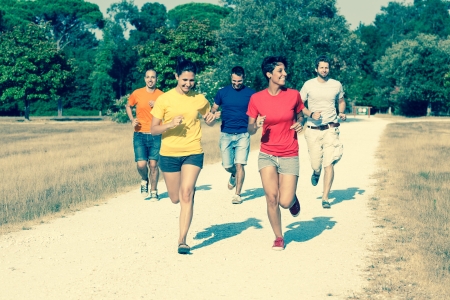 Group of Friends Running Outsideの写真素材