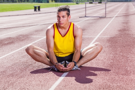 Track and Field Athlete Stretchingの写真素材