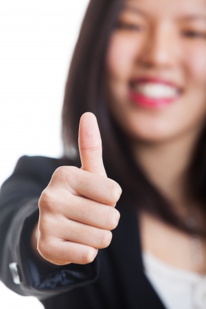 Young Chinese Woman with Thumb Upの写真素材