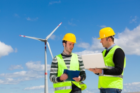 Two Engineers in a Wind Turbine Power Stationの写真素材