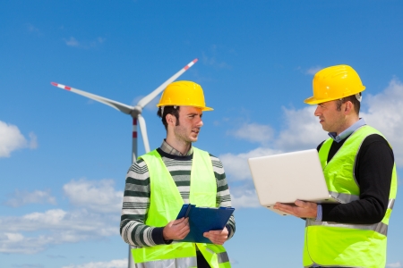 Two Engineers in a Wind Turbine Power Stationの写真素材