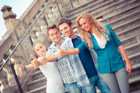 Happy Friends with Thumbs Upの写真素材