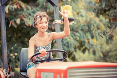 Little Girl on the Tractorの写真素材