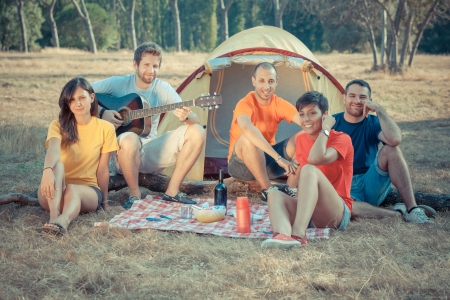 Group of People Camping and Singingの写真素材