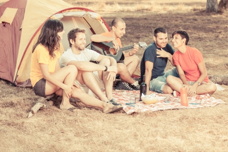 Group of People Camping and Singingの写真素材