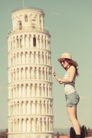 Young Girl with Leaning Tower of Pisaの写真素材
