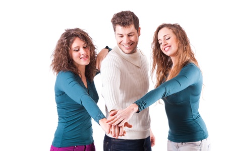 Three Happy Friends with Hands on Stackの写真素材