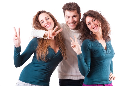 Three Happy Friends Showing Victory Signの写真素材