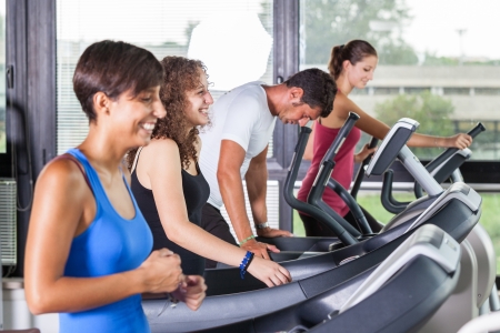 People Running on Treadmill in the Gymの写真素材