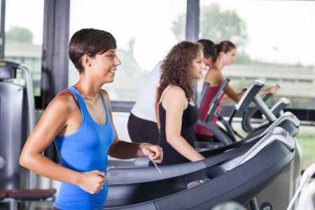 People Running on Treadmill in the Gymの写真素材