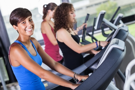 People Running on Treadmill in the Gymの写真素材