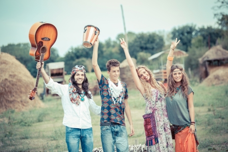Hippie Group Playing Music and Dancing Outsideの写真素材