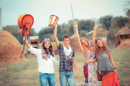 Hippie Group Playing Music and Dancing Outsideの写真素材