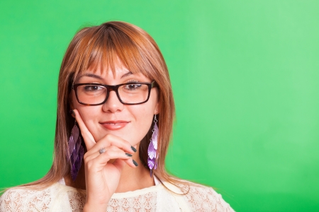 Beautiful Young Woman on Green Backgroundの写真素材