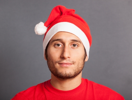 Young Man with Santa Hatの写真素材