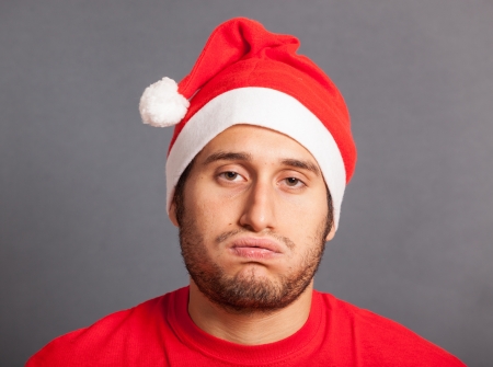 Young Man with Santa Hatの写真素材