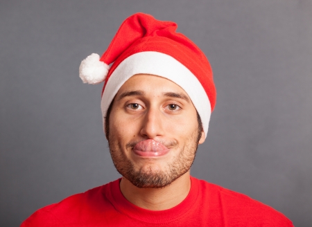 Young Man with Santa Hatの写真素材