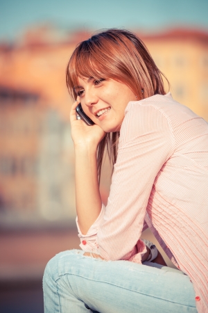 Beautiful Young Woman Talking on Mobile Phoneの写真素材
