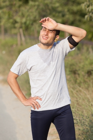 Tired Young Man After Joggingの写真素材