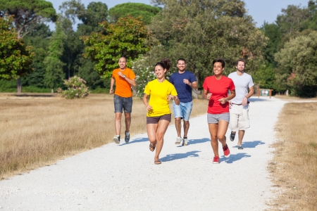 Group of Friends Running Outsideの写真素材