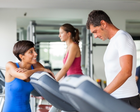 People Running on Treadmill in the Gymの写真素材