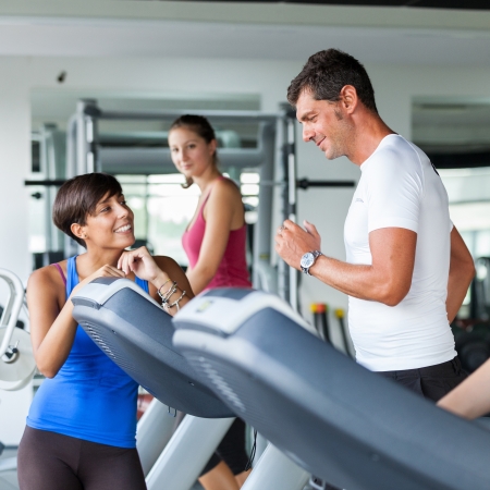 People Running on Treadmill in the Gymの写真素材